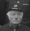 George Verney with postman's cap